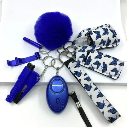 KIT LLAVEROS DE SEGURIDAD Y AUTODEFENSA CON ALARMA PERSONAL MUJER 8 PIEZAS