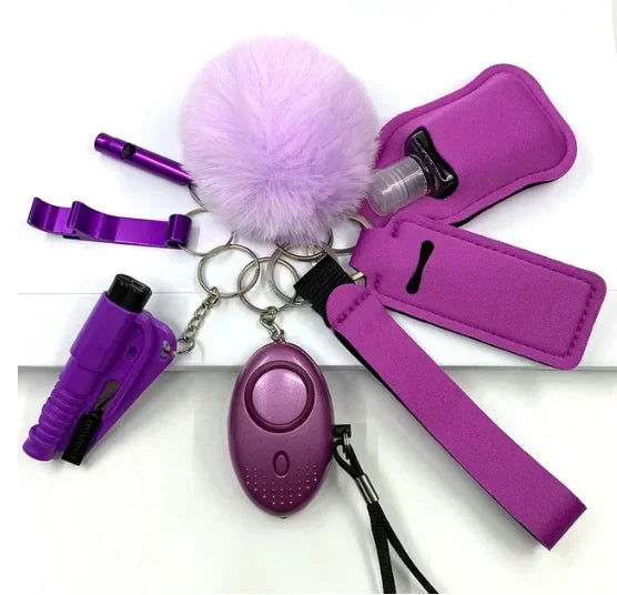 KIT LLAVEROS DE SEGURIDAD Y AUTODEFENSA CON ALARMA PERSONAL MUJER 8 PIEZAS